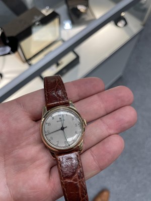 Lot 1519 - A 9 CARAT GOLD ROLEX STRAP WATCH