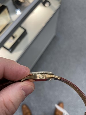 Lot 1519 - A 9 CARAT GOLD ROLEX STRAP WATCH