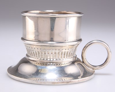 Lot 1422 - A GEORGE V SILVER 'GO TO BED' CHAMBERSTICK