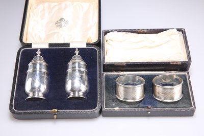 Lot 1402 - A PAIR OF GEORGE V SILVER PEPPER POTS