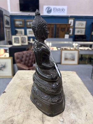Lot 86 - A BRONZE BUDDHA