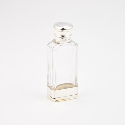 Lot 128 - A VICTORIAN SILVER-MOUNTED SCENT BOTTLE AND VINAIGRETTE COMBINATION