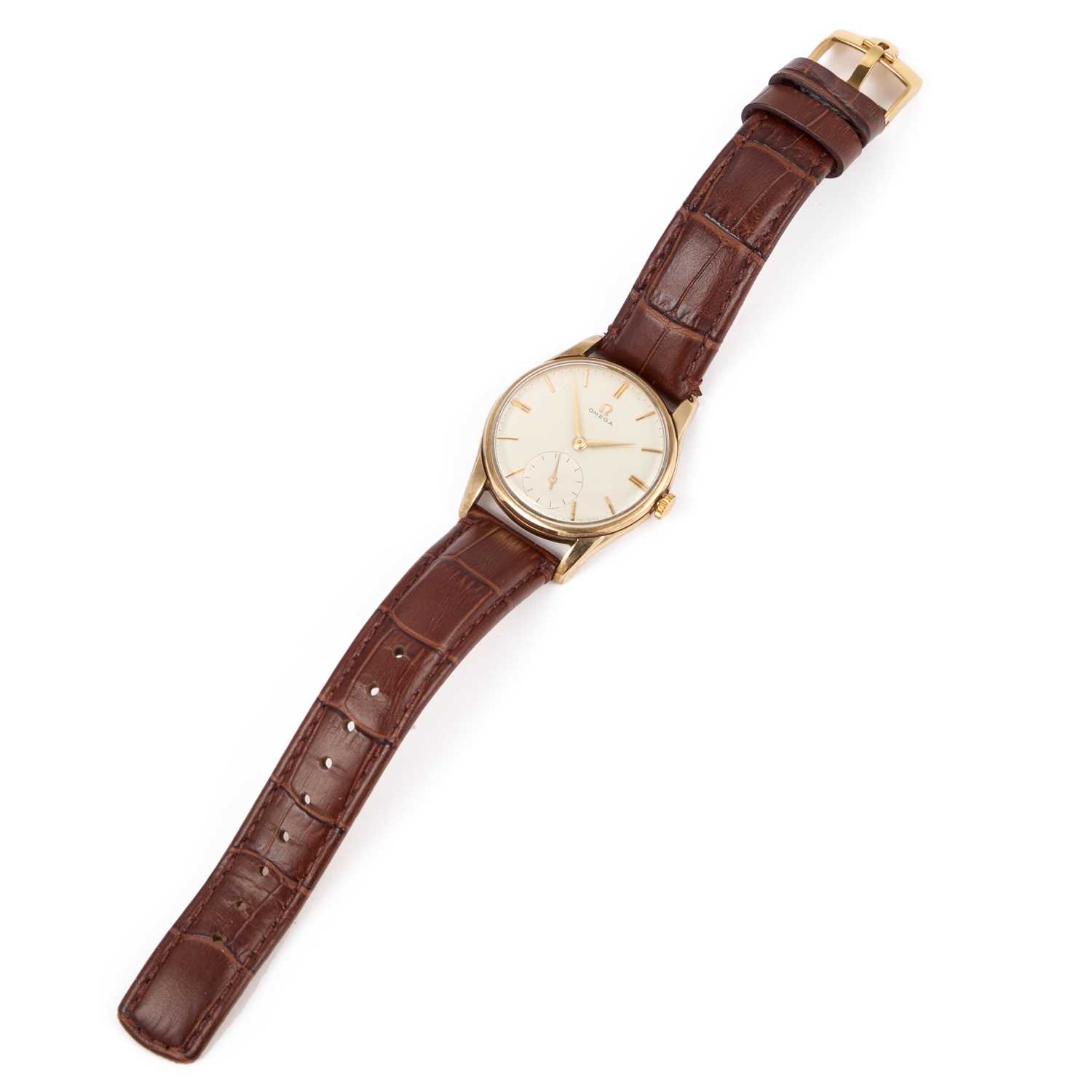 Lot 320 - A GENTS 9CT GOLD OMEGA STRAP WATCH