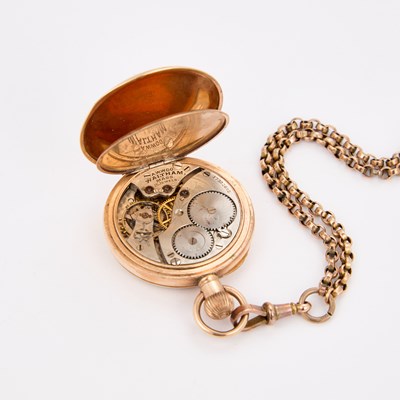 Lot 323 - A ROLLED GOLD WALTHAM FOB WATCH AND A 9CT GOLD CHAIN