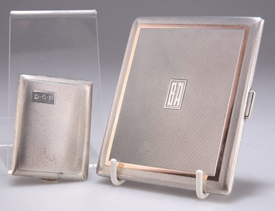 Lot 1463 - A GEORGE V SILVER CARD CASE AND A GEORGE VI SILVER CIGARETTE CASE