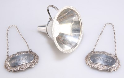 Lot 1478 - TWO ELIZABETH II SILVER DECANTER LABELS AND A NORWEGIAN SILVER WINE FUNNEL, 20TH CENTURY