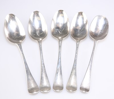 Lot 1187 - A SET OF FOUR GEORGE II SILVER HANOVERIAN SCROLL-BACK TABLE SPOONS