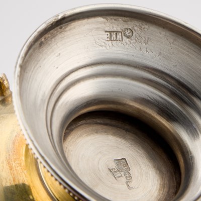 Lot 142 - A RUSSIAN SILVER-GILT TEA-GLASS HOLDER