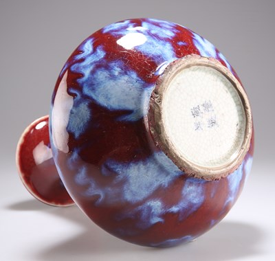 Lot 180 - A CHINESE SANG DE BOEUF VASE