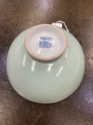 Lot 106 - A CHINESE CELADON-GLAZED PORCELAIN BOWL