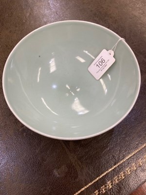 Lot 106 - A CHINESE CELADON-GLAZED PORCELAIN BOWL