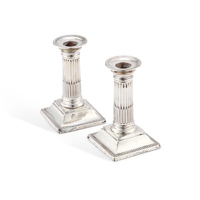 Lot 358 - A PAIR OF GEORGE V SILVER COLUMNAR CANDLESTICKS