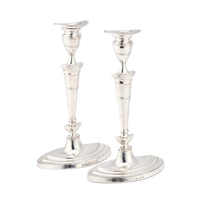 Lot 346 - A PAIR OF NEOCLASSICAL STYLE SILVER CANDLESTICKS