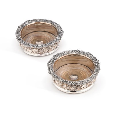 Lot 125 - A PAIR OF OLD SHEFFIELD PLATED WINE COASTERS