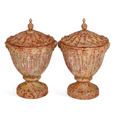 Lot 693 - A PAIR OF ADAM STYLE CAST IRON URNS AND COVERS