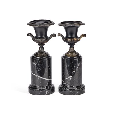 Lot 635 - A PAIR OF BRONZE URNS