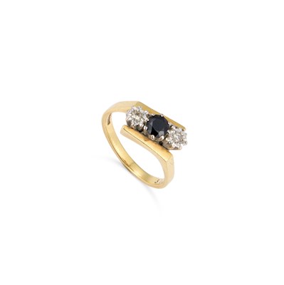 Lot 572 - AN 18 CARAT GOLD SAPPHIRE AND DIAMOND THREE STONE RING