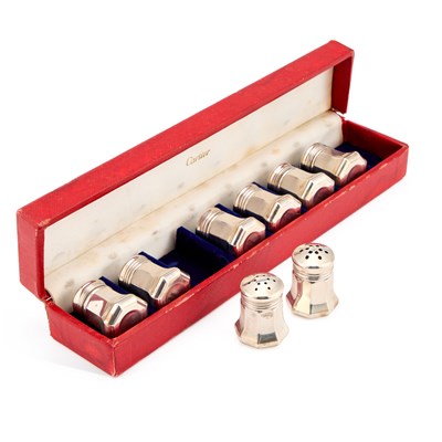 Lot 271 - A SET OF EIGHT CARTIER STERLING SILVER PEPPER POTS