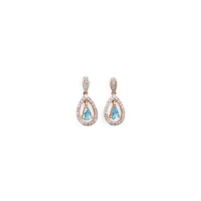 Lot 244 - A PAIR OF BLUE TOPAZ AND DIAMOND PENDANT EARRINGS