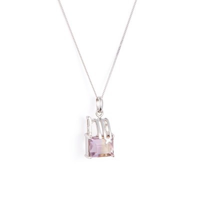 Lot 562 - A 9 CARAT WHITE GOLD AMETRINE VIRGO ZODIAC PENDANT ON CHAIN
