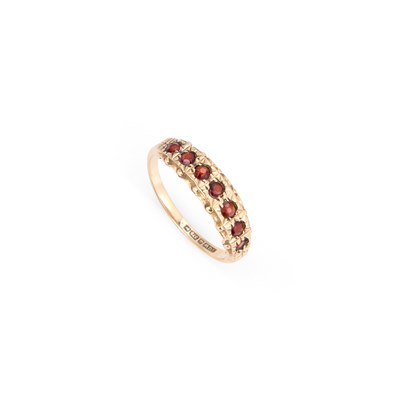 Lot 335 - A 9 CARAT GOLD GARNET HALF HOOP RING