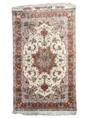 Lot 259 - A TABRIZ RUG