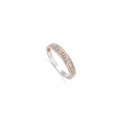 Lot 298 - A 9 CARAT WHITE GOLD DIAMOND HALF HOOP RING