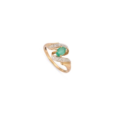 Lot 362 - A 9 CARAT GOLD EMERALD AND DIAMOND RING