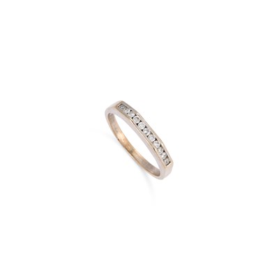 Lot 329 - A 9 CARAT WHITE GOLD DIAMOND HALF HOOP RING