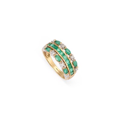 Lot 555 - A 9 CARAT GOLD EMERALD AND DIAMOND BAND RING