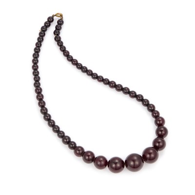 Lot 380 - A DARK CHERRY RED BAKELITE BEAD NECKLACE