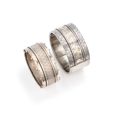 Lot 372 - TWO VICTORIAN AESTHETIC MOVEMENT HINGE OPENING BANGLES