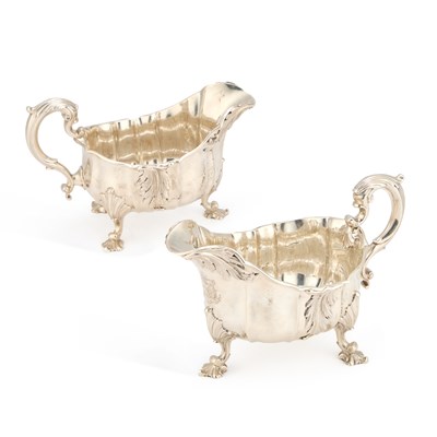 Lot A LARGE PAIR OF EARLY VICTORIAN SILVER SAUCEBOATS
