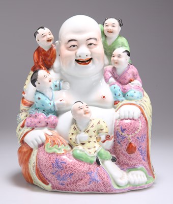 Lot 130 - A CHINESE FAMILLE ROSE FIGURE OF A LAUGHING BUDDHA AND CHILDREN