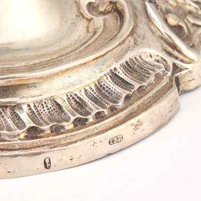Lot A PAIR OF 18TH CENTURY GERMAN SILVER THREE-LIGHT CANDELABRA