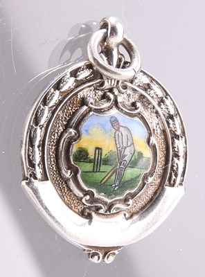 Lot 131 - AN ELIZABETH II SILVER CRICKETING FOB