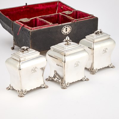Lot A SET OF TWO CASED GEORGE III SILVER TEA CADDIES AND A SUGAR BOX