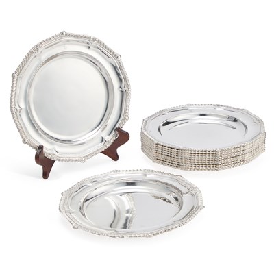 Lot 474 - A SET OF TWELVE GEORGE III SILVER DINNER PLATES