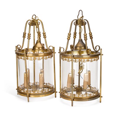 Lot 695 - A LARGE PAIR OF BRASS LANTERNS