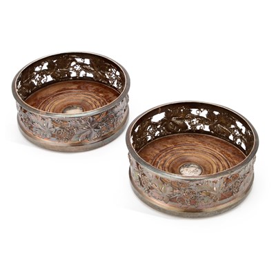 Lot 323 - A PAIR OF EARLY VICTORIAN SILVER WINE COASTERS