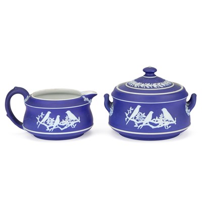Lot 58 - A WEGDWOOD BLUE JASPER SUCRIER AND CREAM JUG