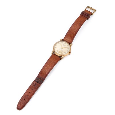 Lot 503 - A GENTS 9CT GOLD BAUME STRAP WATCH