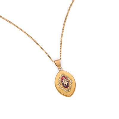 Lot 582 - A VICTORIAN CARBUNCLE GARNET AND SEED PEARL PENDANT ON CHAIN