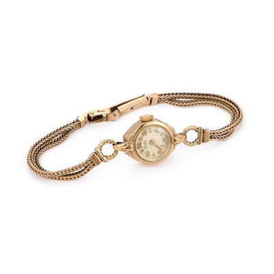 Lot 516 - A LADY'S 9CT GOLD LEDA BRACELET WATCH