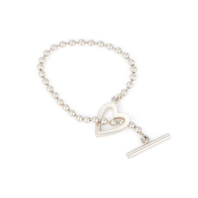 Lot 243 - GUCCI, A HEART TOGGLE BEAD BRACELET