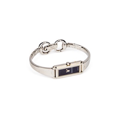 Lot 227 - A LADY'S STEEL GUCCI BANGLE WATCH