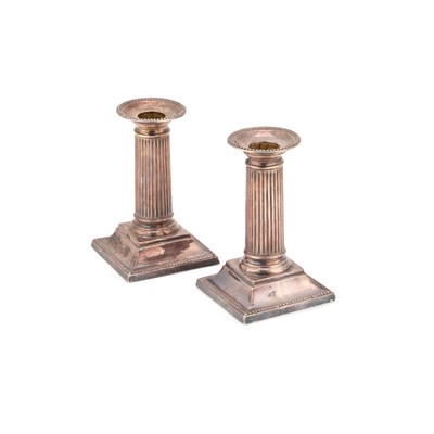 Lot 423 - A PAIR OF LATE VICTORIAN SILVER COLUMNAR CANDLESTICKS