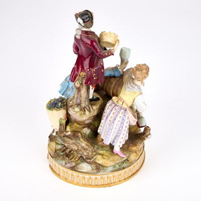Lot 43 - A 19TH CENTURY MEISSEN FIGURE GROUP OF THE THREE WINEMAKERS