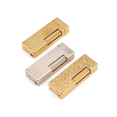 Lot 616 - THREE DUNHILL ROLLAGAS POCKET CIGARETTE LIGHTERS