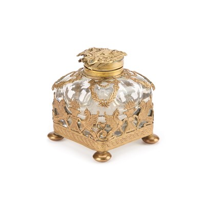 Lot 181 - REGIMENTAL INTEREST: A GILT-METAL MOUNTED GLASS INKWELL